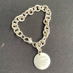 Authentic Tiffany & Co Sterling Silver link bracelet with a round tag